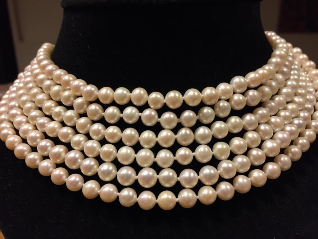 Multi layered pearl necklace