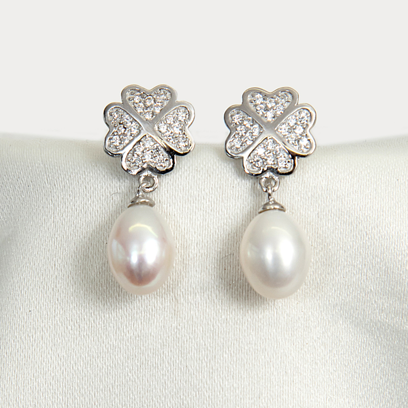 Silver Hearts on pearl earrings