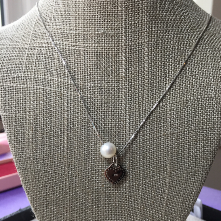 Pearl and heart pendant