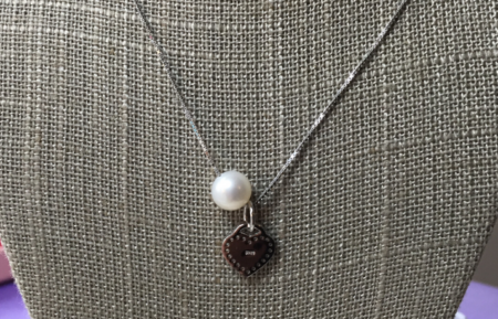 Pearl and heart pendant