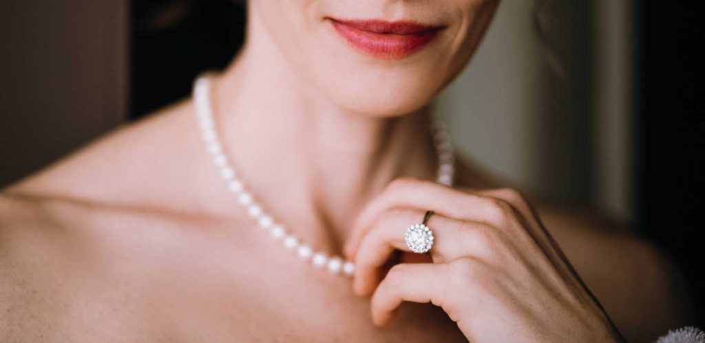 Woman wearing pearl necklace