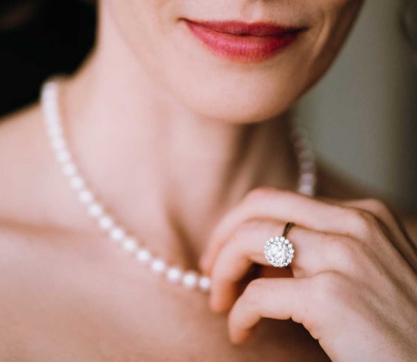 Woman wearing pearl necklace