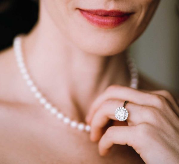 Woman wearing pearl necklace Woman wearing pearl necklace