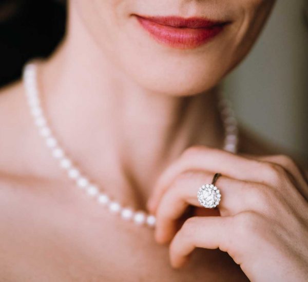 Woman wearing pearl necklace